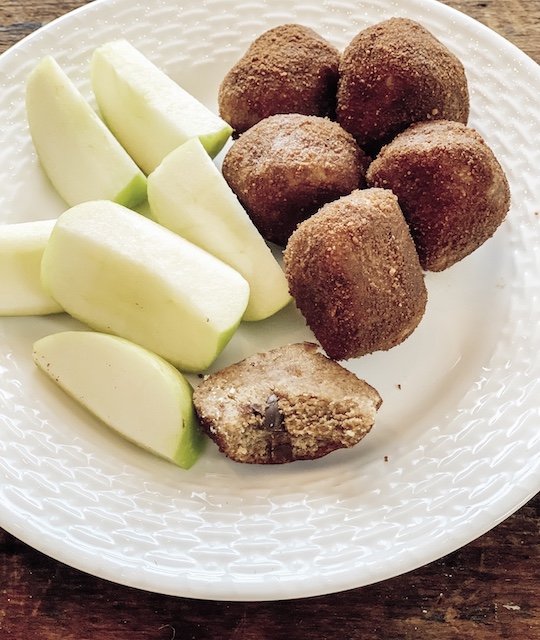 A snack plate with apples and Paleo Snickerdoodle Cookie bites.