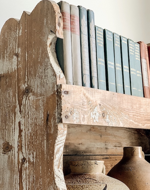 An old bookcase used as home decor.