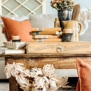 A vintage table filled with vintage items as decor