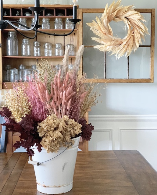 Dried blooms in an arrangement for fall