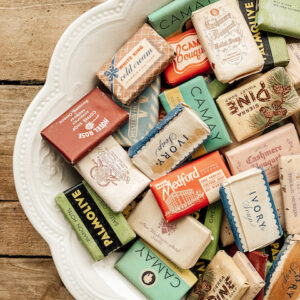 A soap dish full of vintage soaps