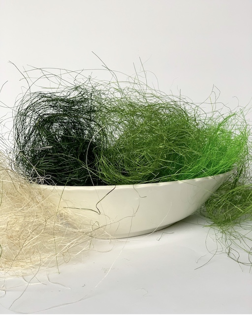 different colors of sisal in a bowl