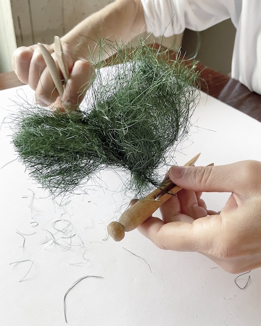 twisting wire to create a bottle brush tree