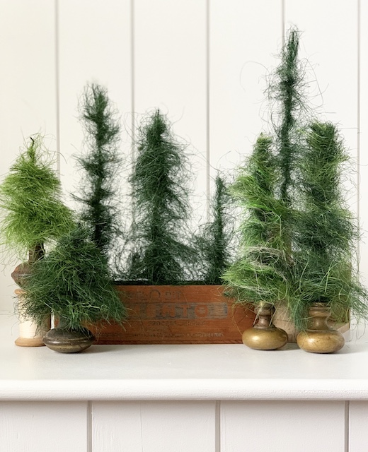 a bunch of home made bottle brush trees