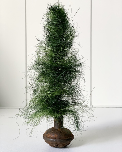 a single bottle brush tree on a table