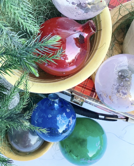 old ornaments distressed in a bowl