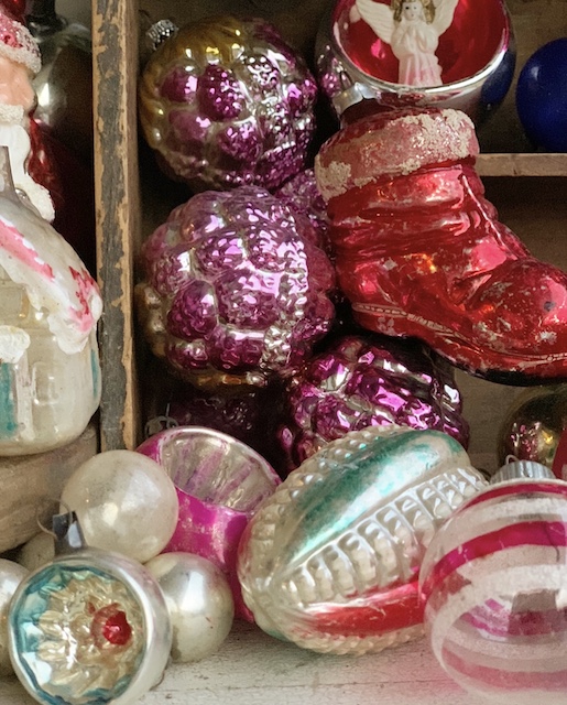 a pile of vintage ornaments