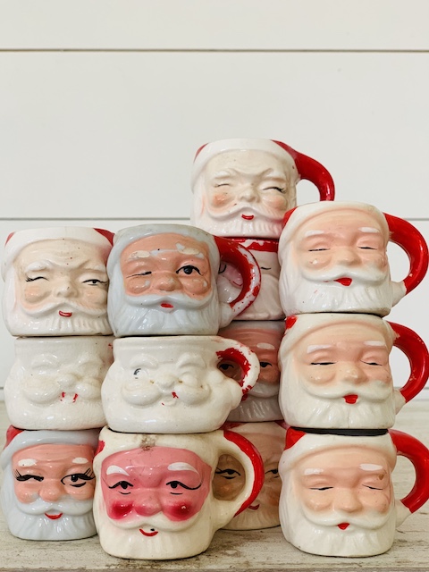 a stack of mini mugs