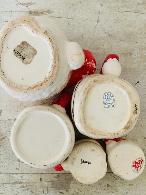 the bottom of old santa mugs with markings