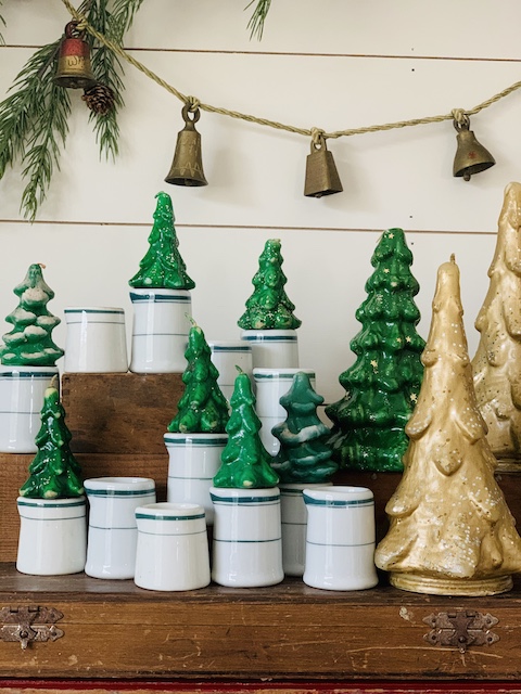 vintage christmas tree candles layered in on top of the creamers