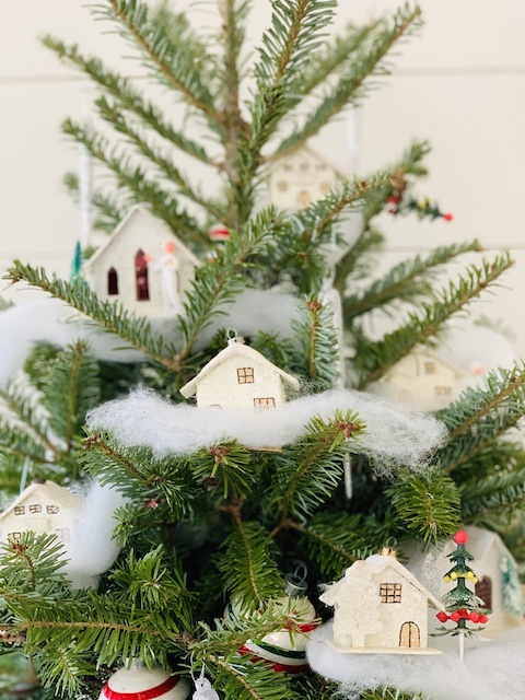 putz houses on a stubby Christmas  tree
