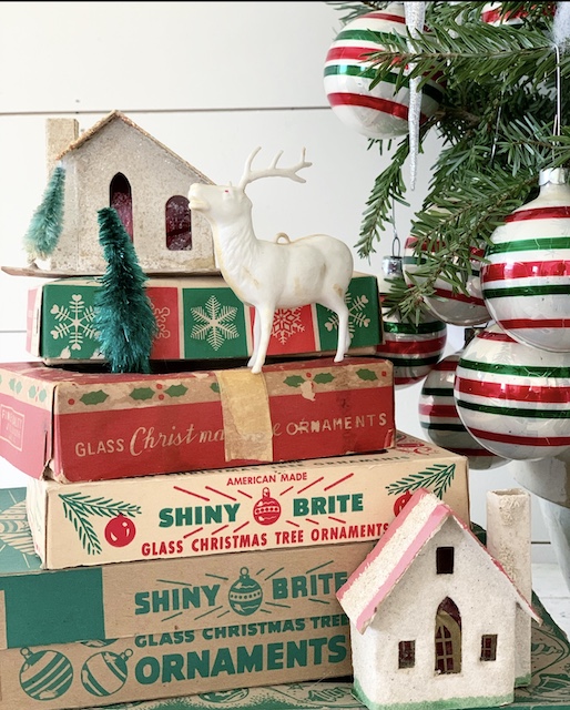 a stack of shiny brite boxes