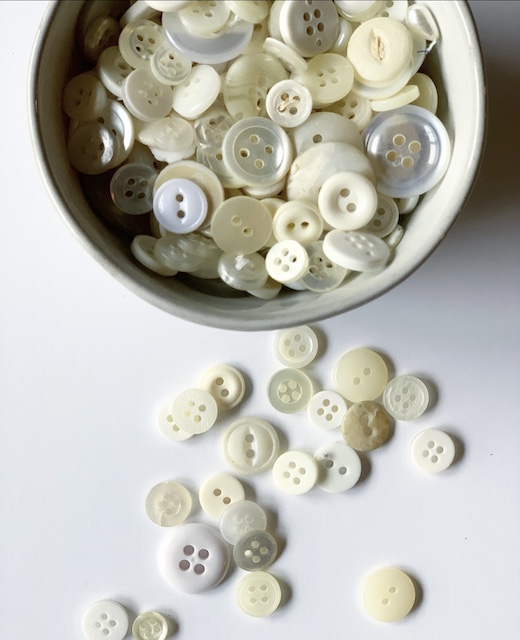 a bowl of buttons