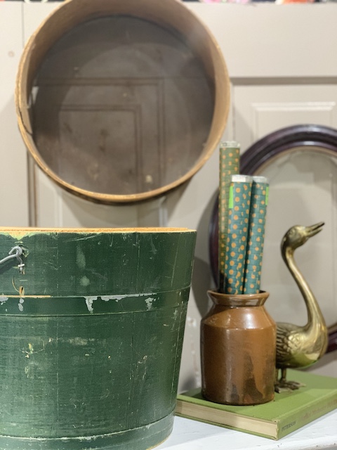 green and brass in an antique booth