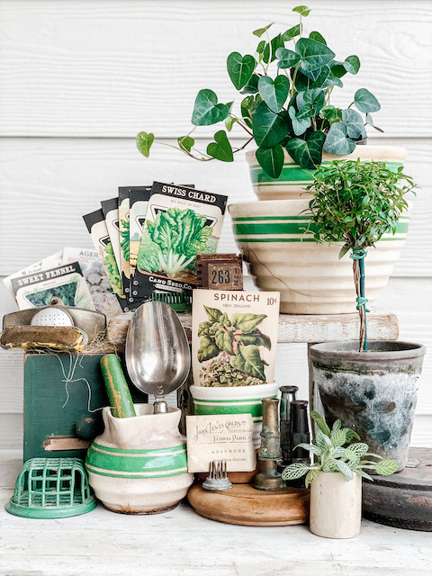 vintage garden items displayed on a table