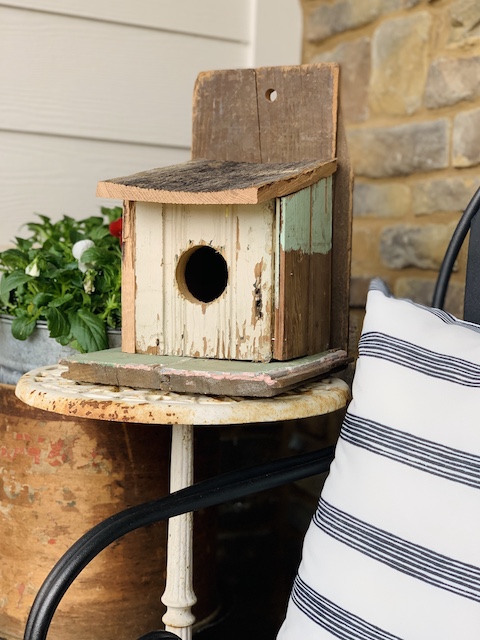 birdhouse on front porch