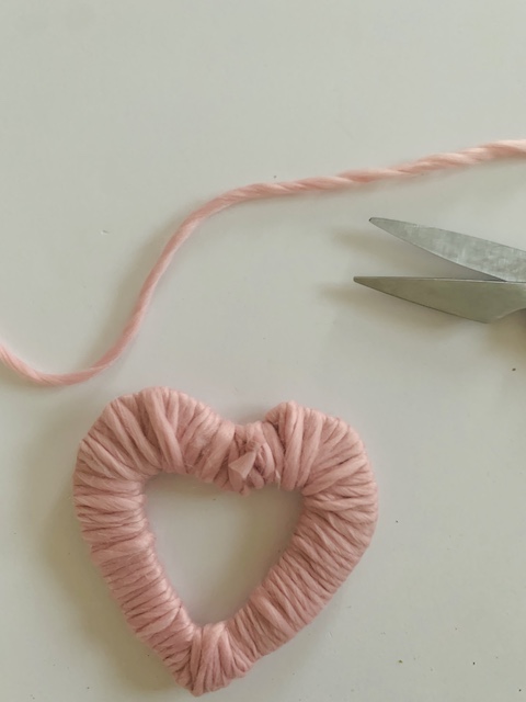 yarn heart that has the center cut out