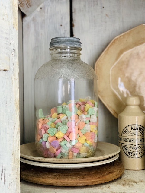 conversation hearts styled in a jar