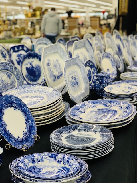 a huge collection of antique blue dishes