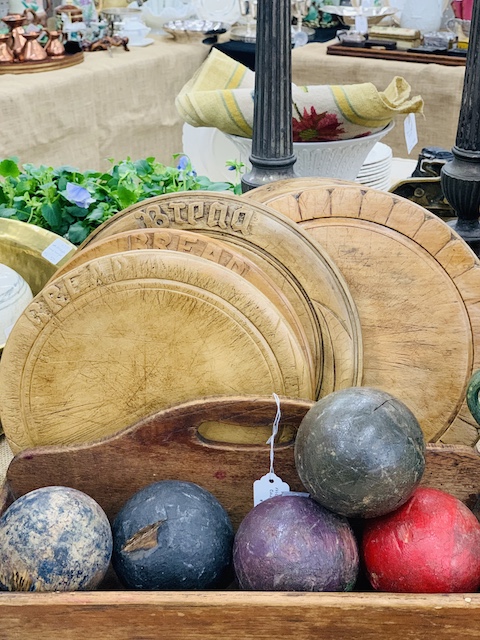vintage bread boards in a pile