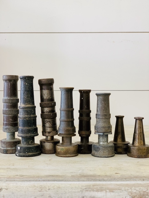 a collection of vintage nozzles