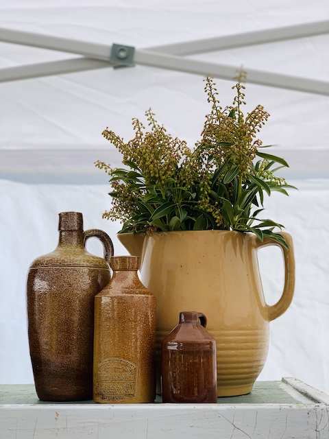 last minute vignette at the sale full of stoneware