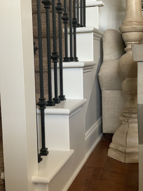 the trim of the stairs painted white