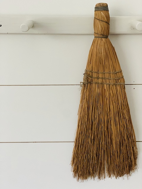 long old whisk broom