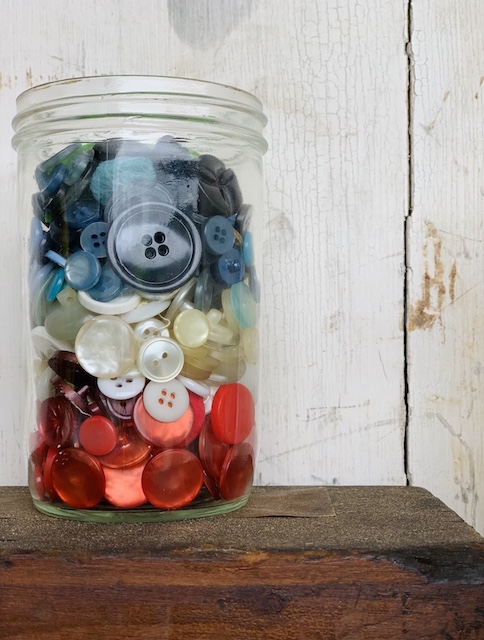 a jar of vintage buttons