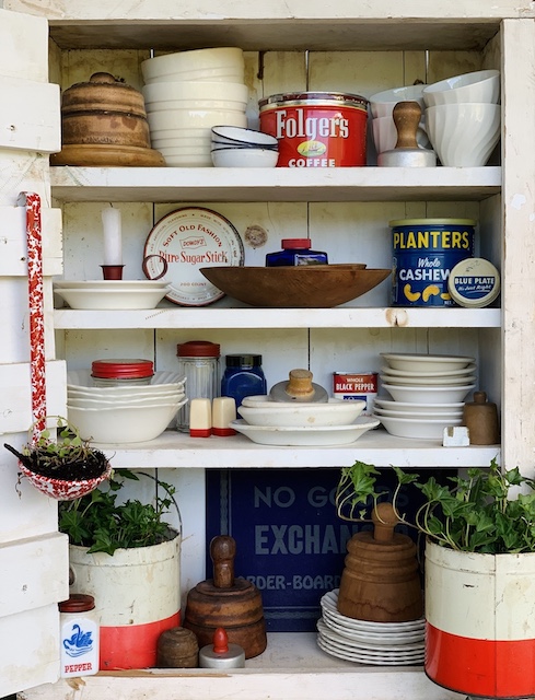 vintage kitchen items used on shelves as patriotic decor