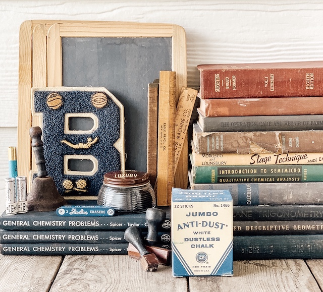 book stack and chalk board