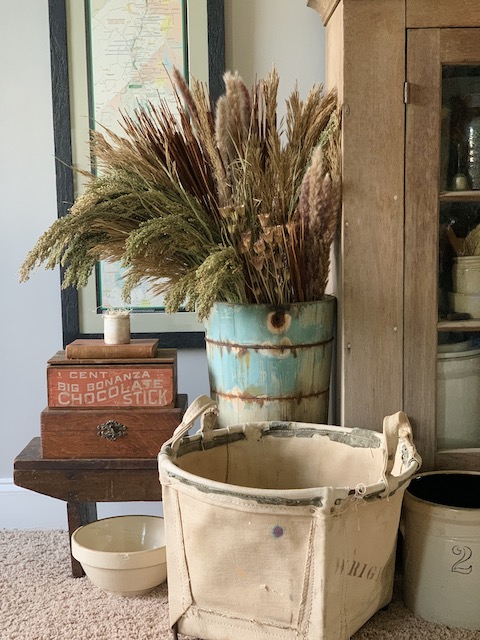 a view of the arrangement and the canvas basket