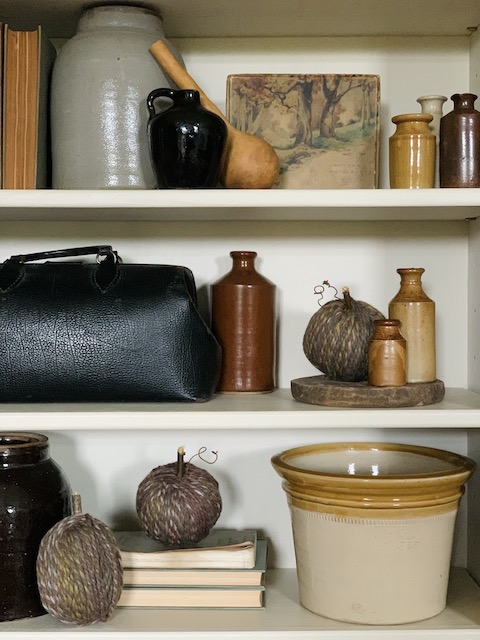 on shelf with vintage goodies