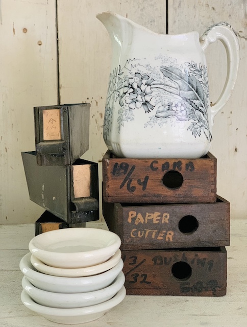 vintage pile of goodies:  drawers and butter pats