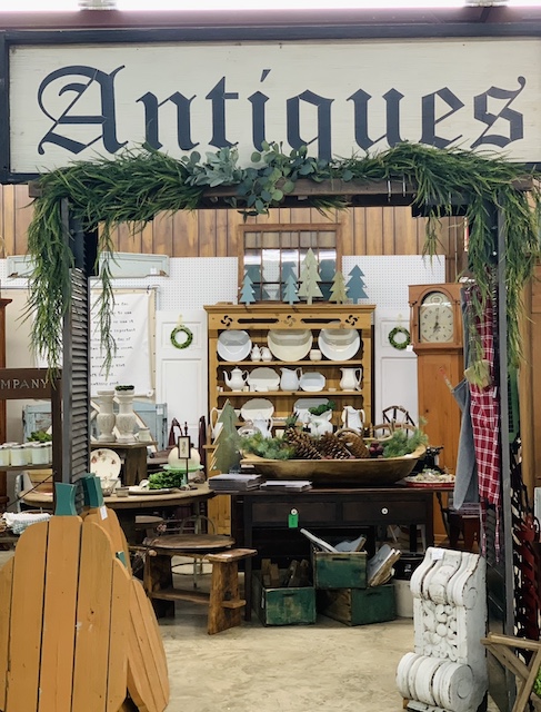 a huge antiques sign