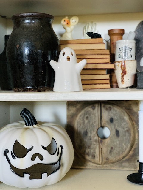 the white spooky pumpkin that sparked these haunted shelves up close