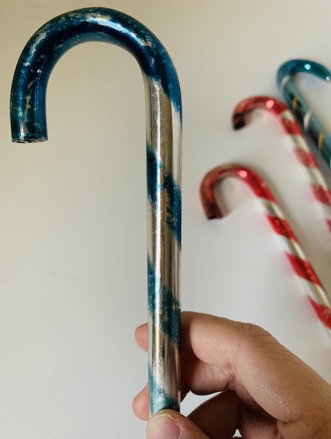 one of the glass candy canes up close