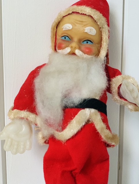 up close of the santas face and the large white hands