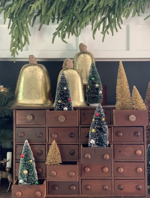 bottle brush trees tucked into the drawers