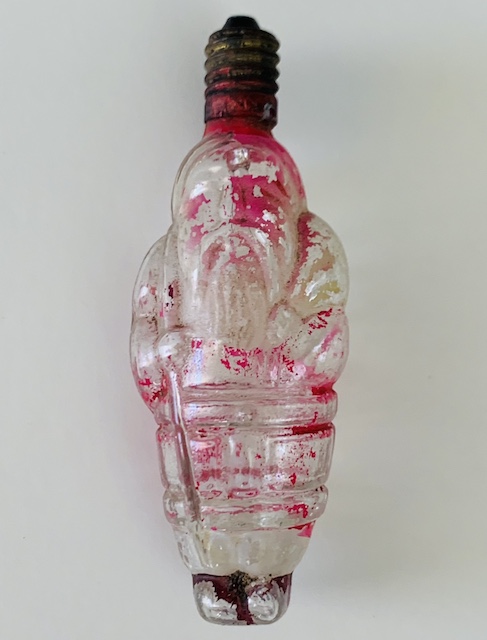 figural bulb with chipped paint