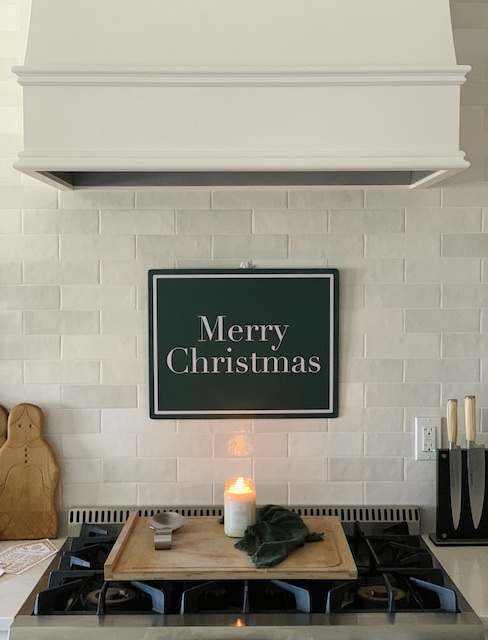vent hood and sign in kitchen