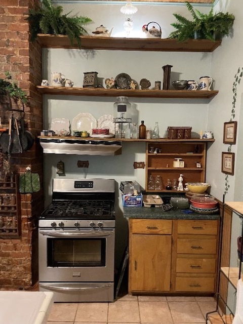 the kitchen inside the old home
