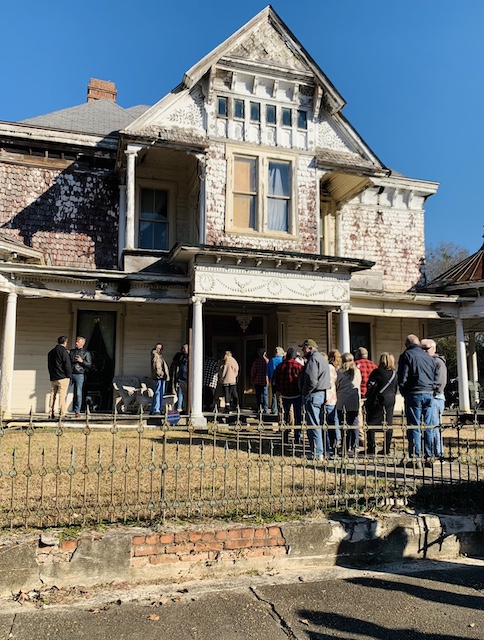 the victorian home with an estate sale line