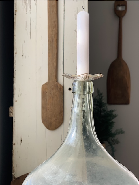 a jug with a candle