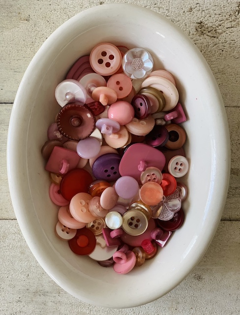 a bowl full buttons
