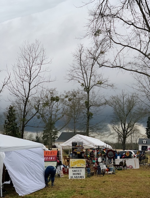rain storm clouds heading our way at the vintage pasture sale