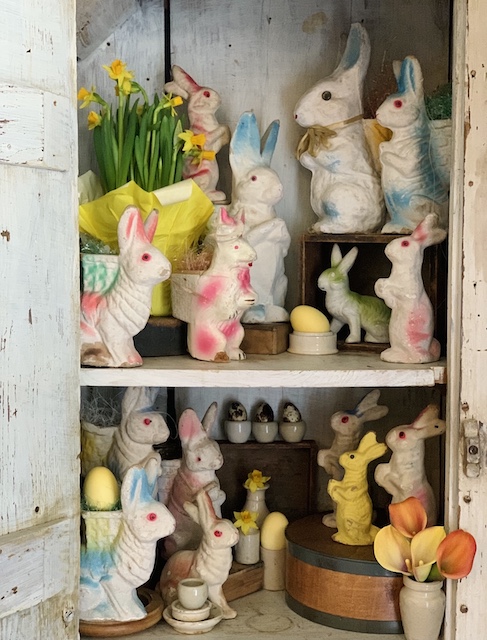 paper mache bunnies in the white cupboard on my vintage Easter Home Tour - 