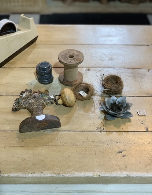 items for my Simple Spring Garden Cloche sitting in the store counter