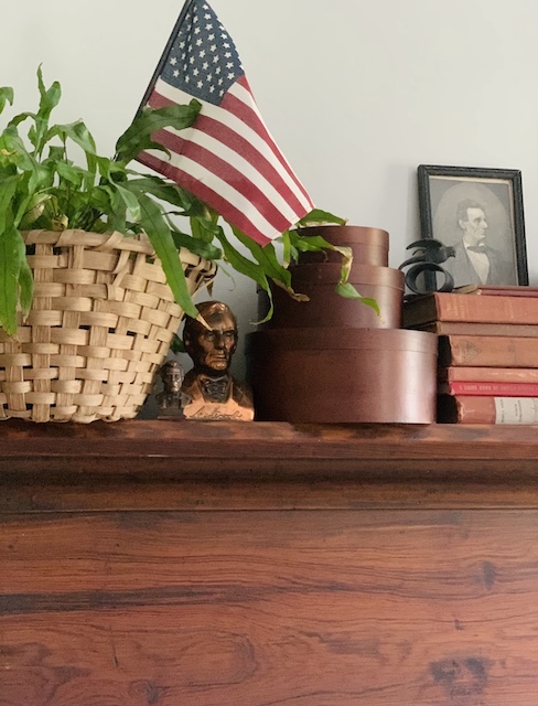 showing the nesting boxes sitting on the vintage patriotic mantel