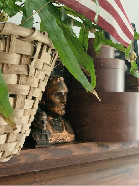 Lincoln busts sitting on my vintage patriotic mantel